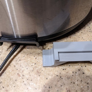 Instant Pot IP-LUX: Praktisk Ledningsholder for Organiseret Opbevaring