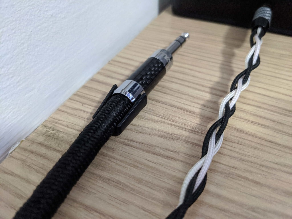 Kabelholder til montering med dobbeltklæbende tape eller lim