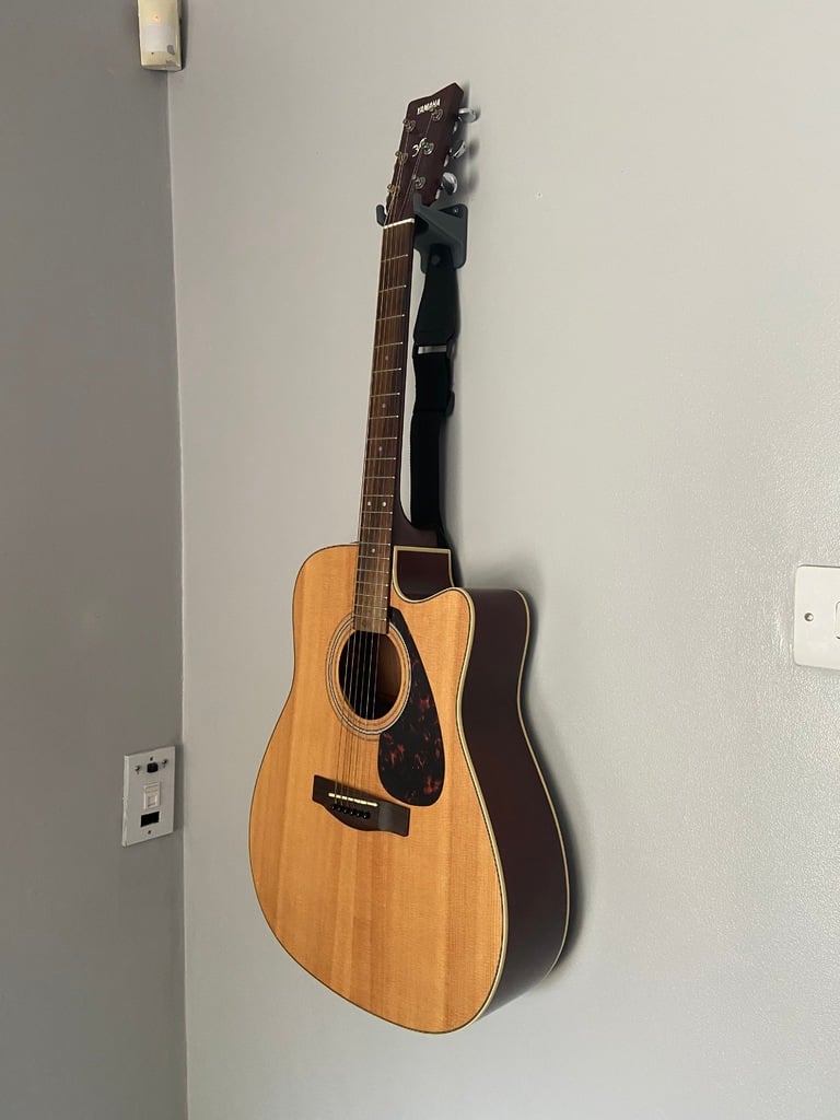 Guitar Vægmontering med plads til picks og rem